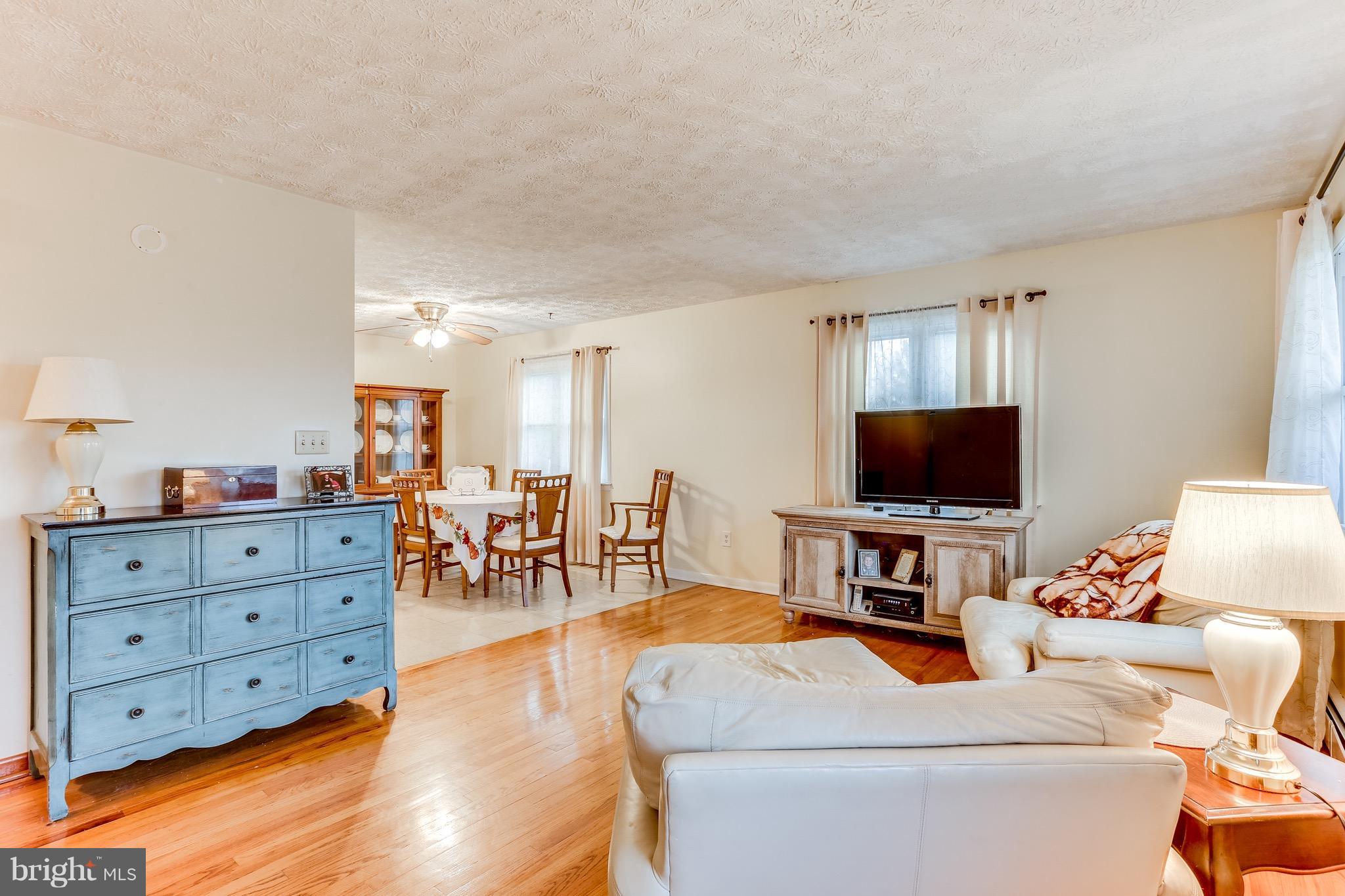 2229 Gablehammer Road Westminster, MD 21157 - Photo 7 of 30 a living room with furniture and a flat screen tv