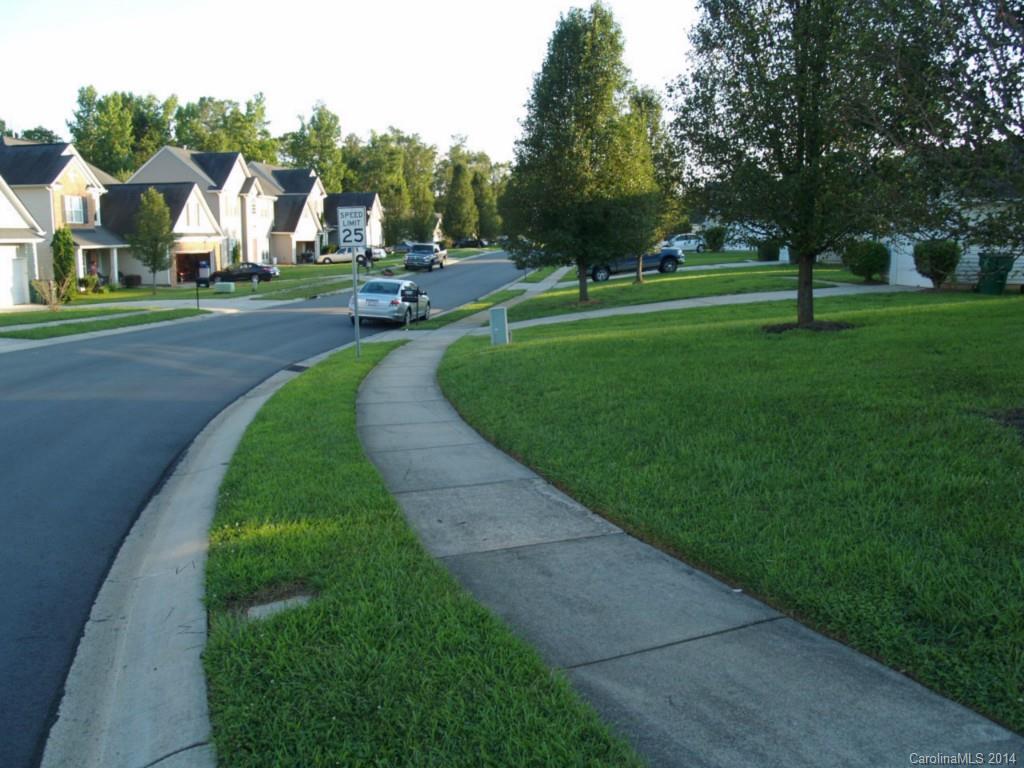 10402 Gold Pan Road Charlotte, NC 28215 - Photo 18 of 21 a view of a park with large trees