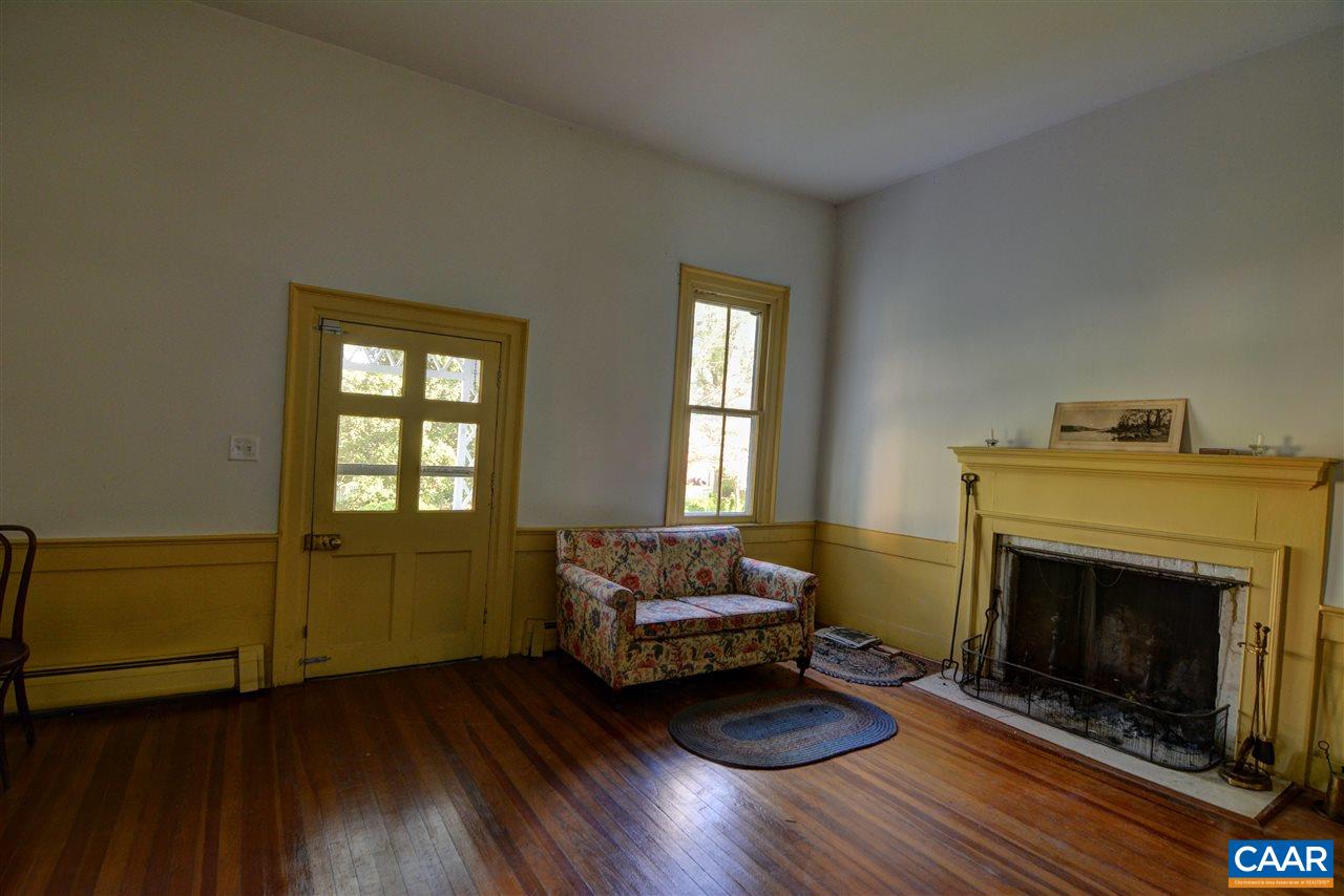 1928 Little Creek Road Dillwyn, VA 23936 - Photo 8 of 15 a living room with furniture and a fireplace