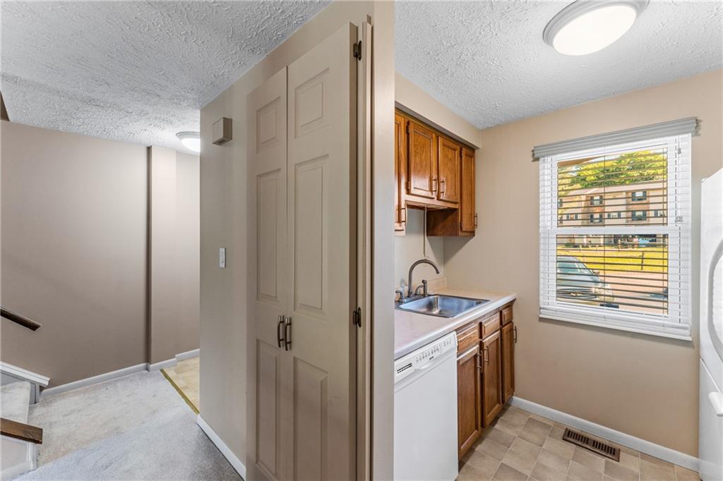 113 Forest Drive Seven Fields, PA 16046 - Photo 13 of 32 a room with a sink and a window