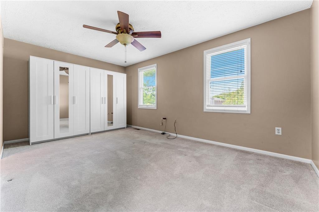 113 Forest Drive Seven Fields, PA 16046 - Photo 15 of 32 a view of an empty room with a window