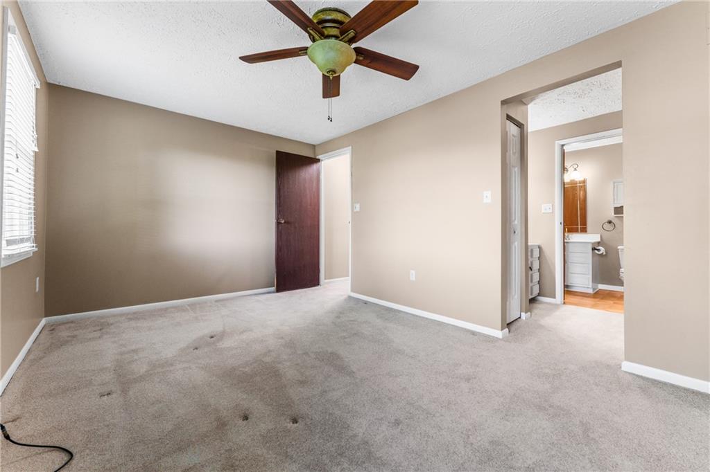 113 Forest Drive Seven Fields, PA 16046 - Photo 17 of 32 an empty room with fan and windows