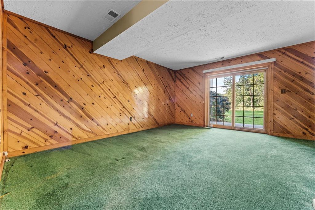 113 Forest Drive Seven Fields, PA 16046 - Photo 23 of 32 a view of an empty room with a window