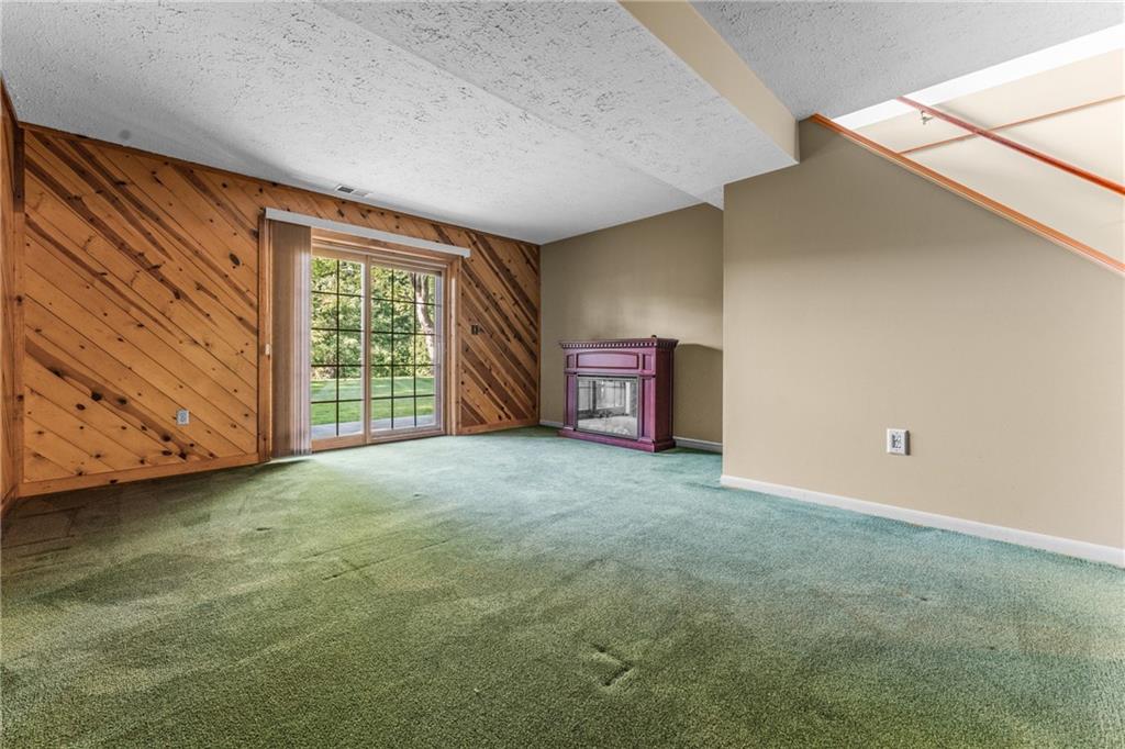 113 Forest Drive Seven Fields, PA 16046 - Photo 24 of 32 a view of an empty room with a window