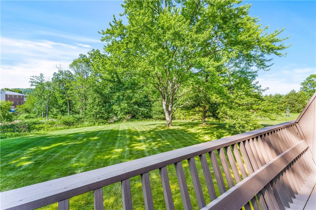 113 Forest Drive Seven Fields, PA 16046 - Photo 28 of 32 a view of a green field with wooden fence