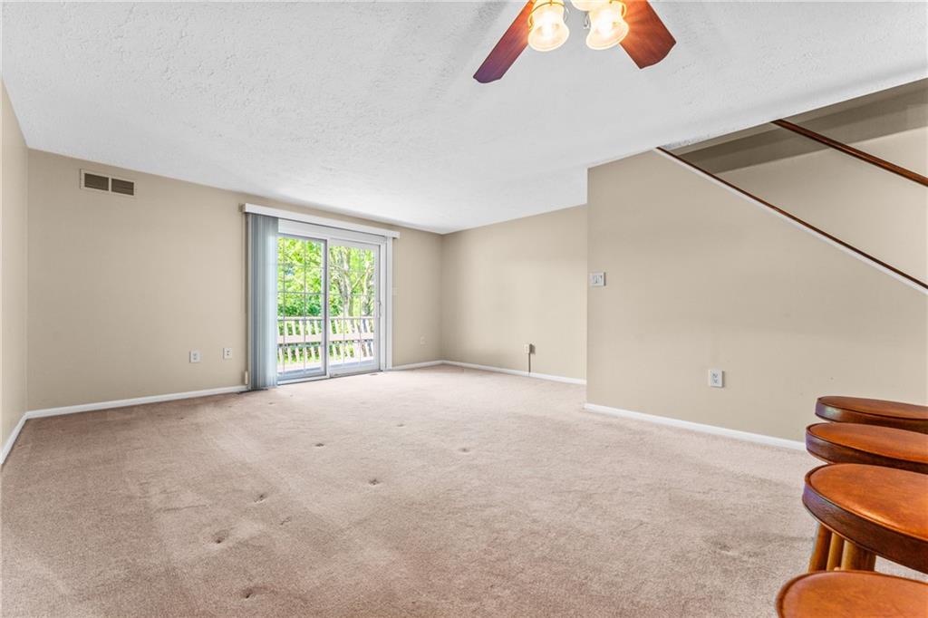 113 Forest Drive Seven Fields, PA 16046 - Photo 5 of 32 a view of an empty room with a window