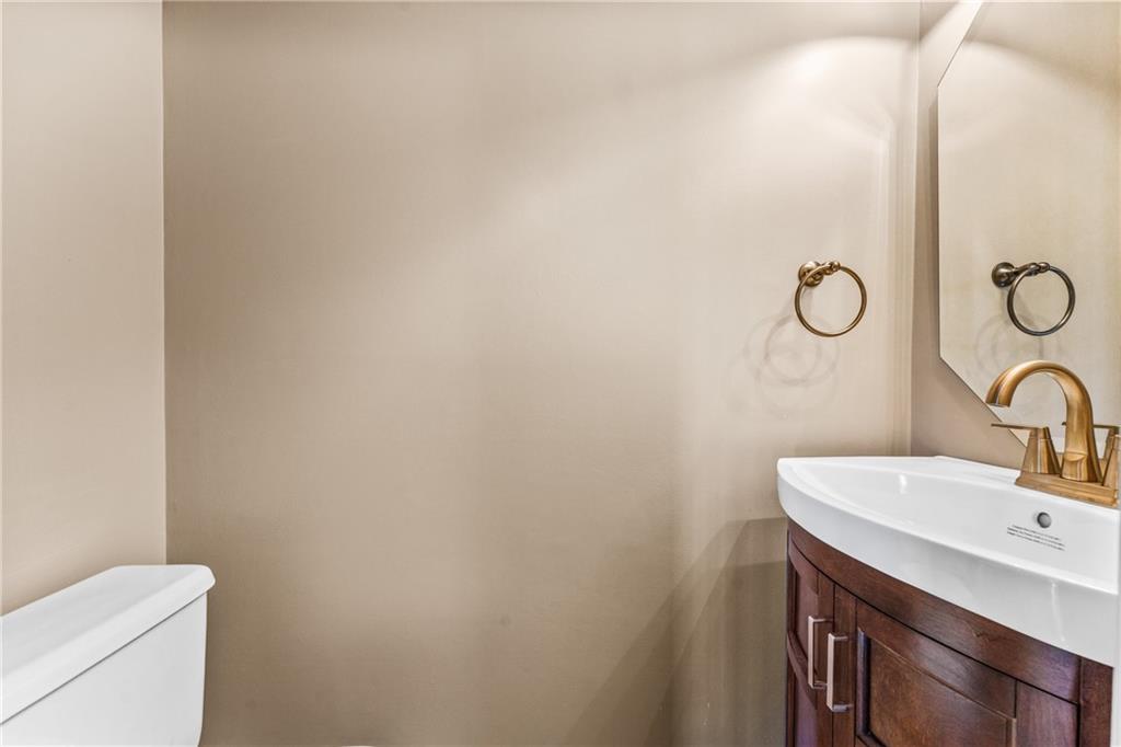 113 Forest Drive Seven Fields, PA 16046 - Photo 8 of 32 a bathroom with a sink toilet and vanity