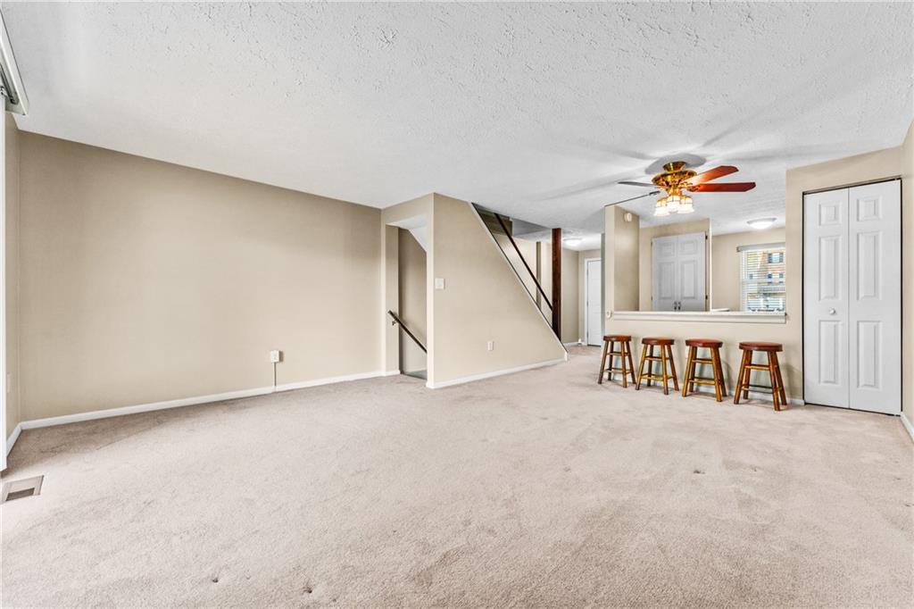 113 Forest Drive Seven Fields, PA 16046 - Photo 9 of 32 a view of an empty room with a window