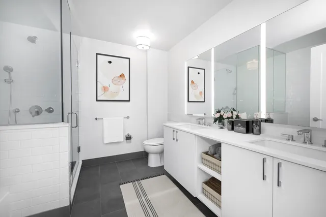 a bedroom with bed and a couch