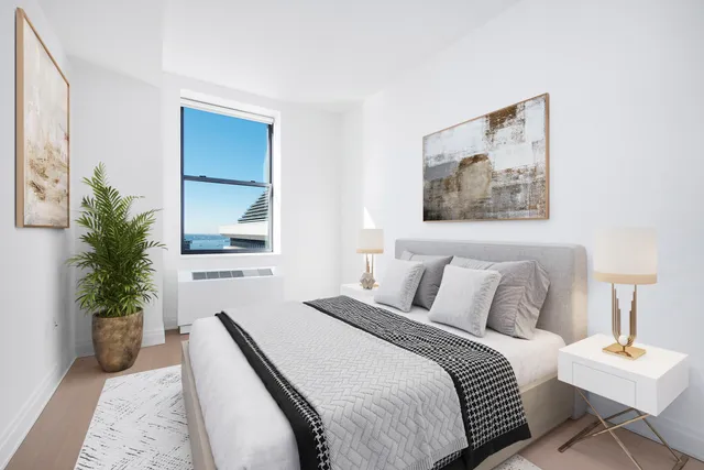 a bathroom with a double vanity sink a mirror and a toilet