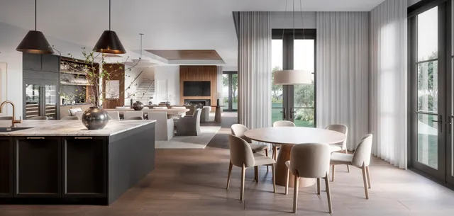 a kitchen with stainless steel appliances a dining table and chairs