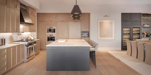 a kitchen with a sink appliances and cabinets