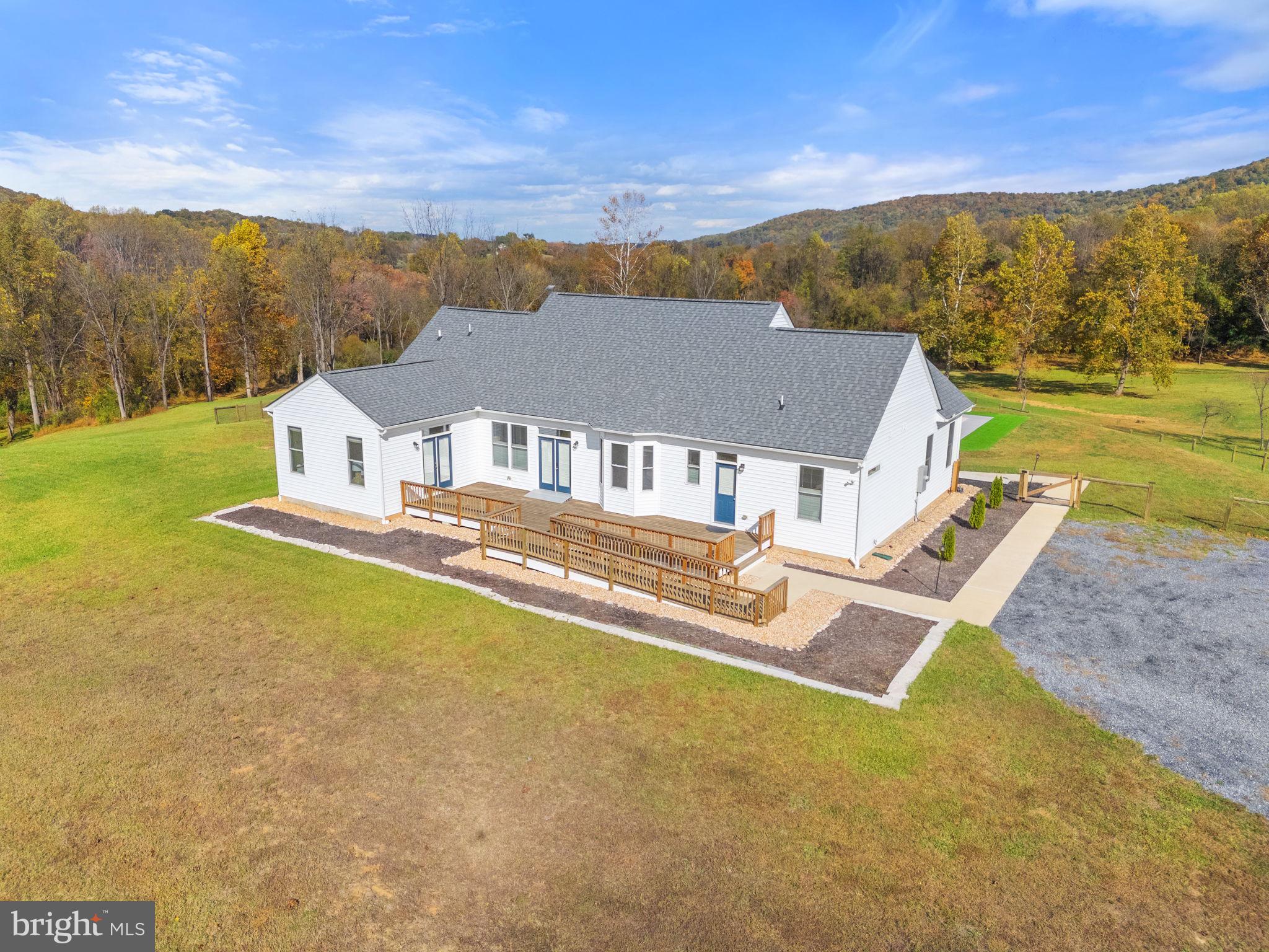 4050 Carrington Road Markham, VA 22643 - Photo 21 of 51 a view of a house with a yard