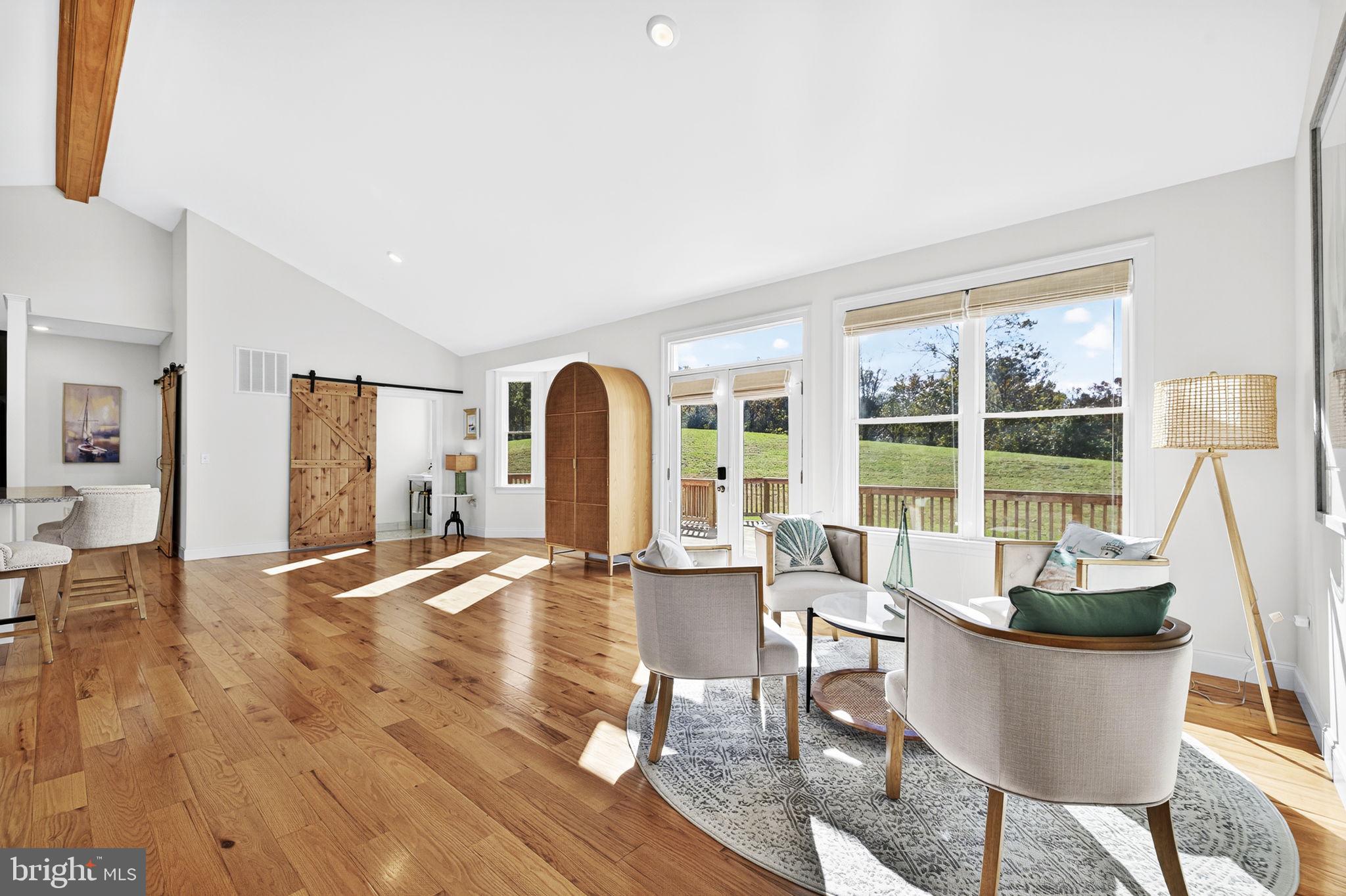 4050 Carrington Road Markham, VA 22643 - Photo 25 of 51 a living room with fireplace furniture and a large window