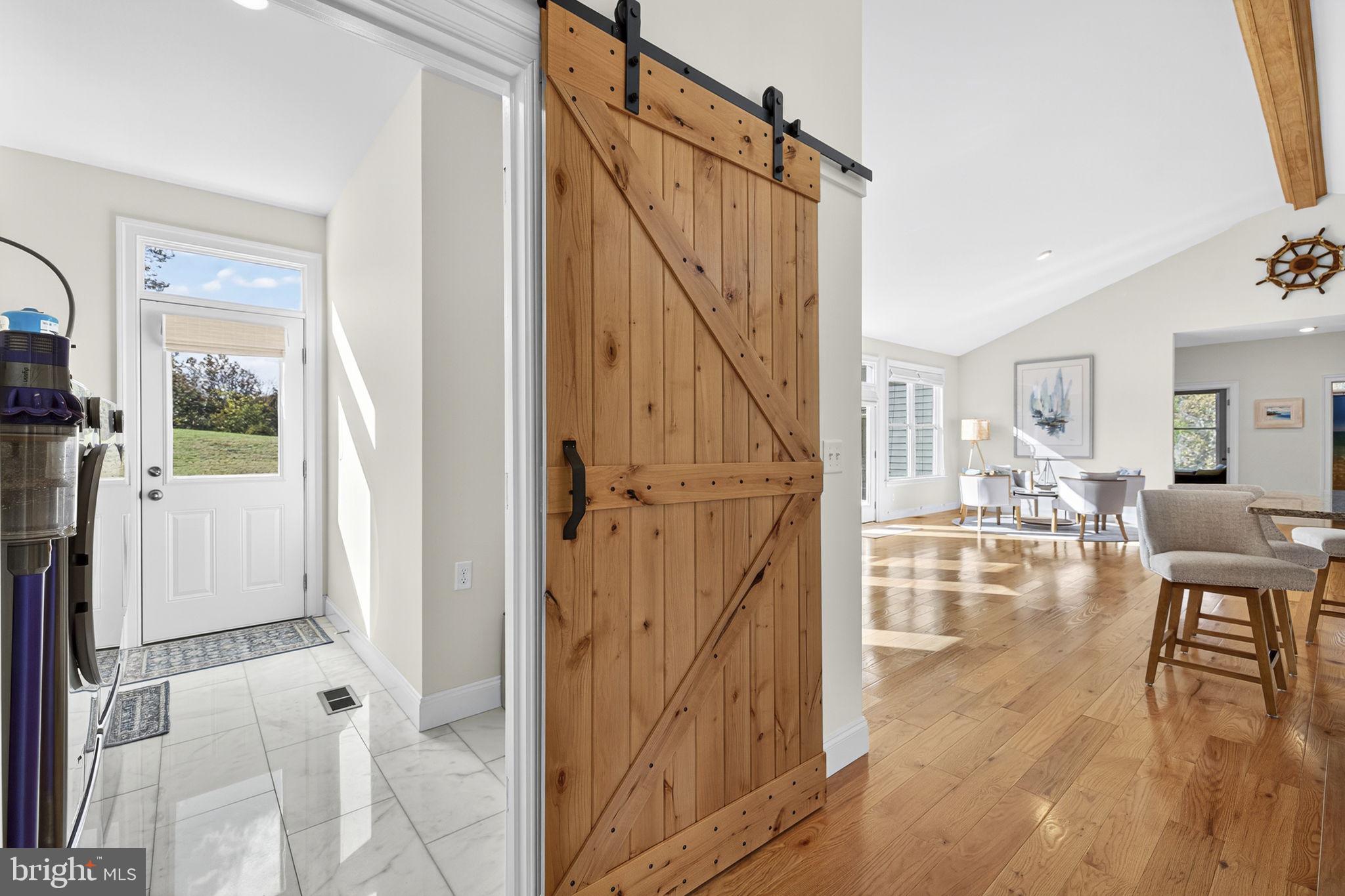 4050 Carrington Road Markham, VA 22643 - Photo 31 of 51 view of living room and kitchen view with wooden floor
