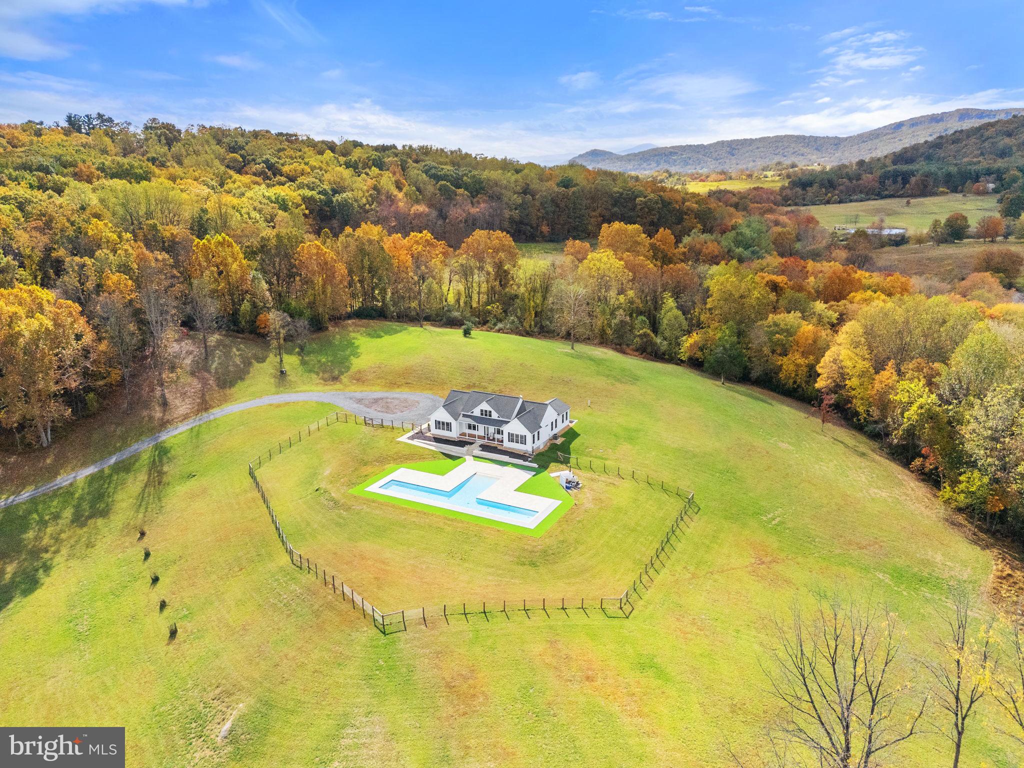 4050 Carrington Road Markham, VA 22643 - Photo 10 of 51 a view of a swimming pool and an outdoor space