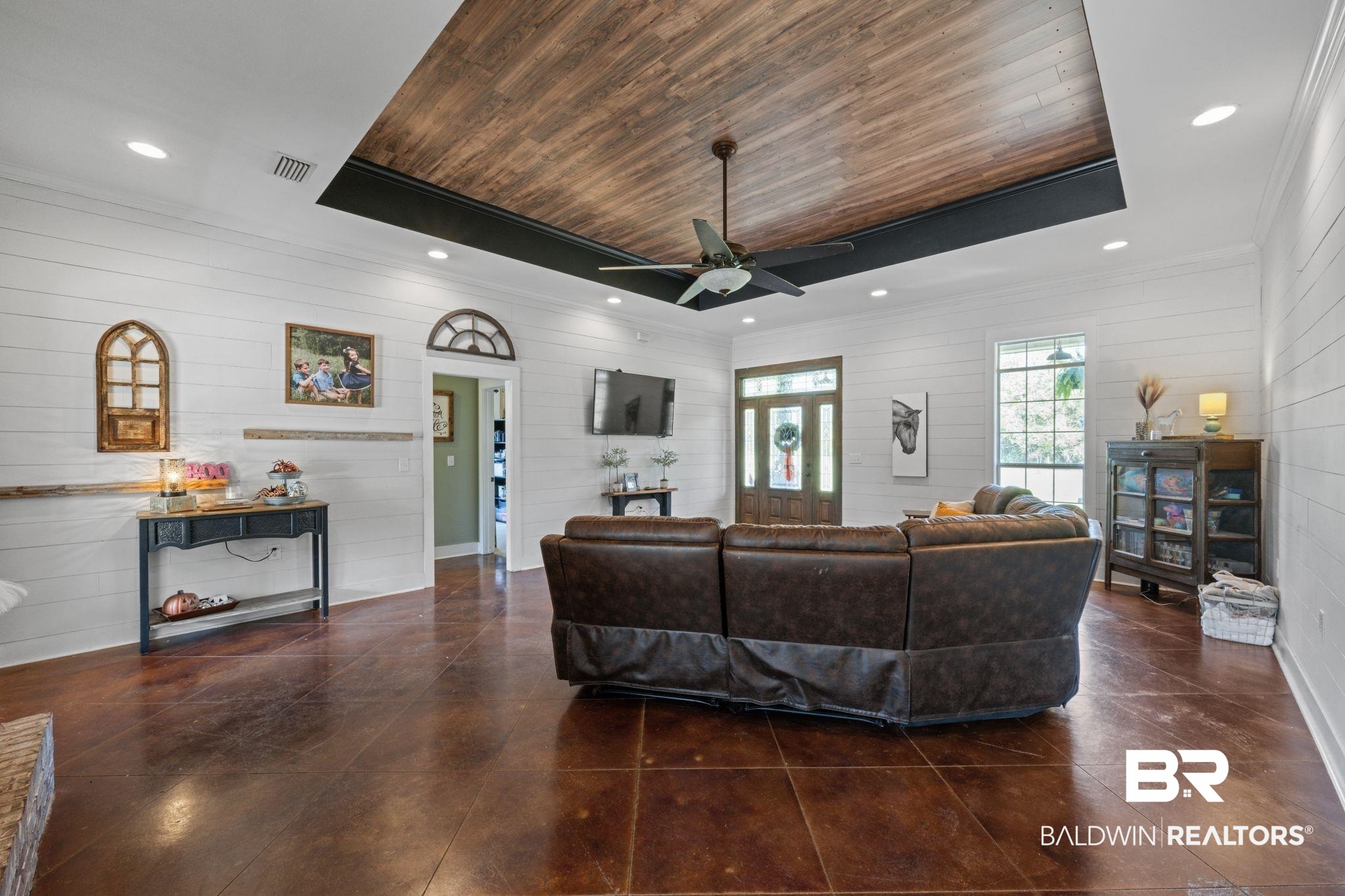 15635 North A N Brady Road Bay Minette, AL 36507 - Photo 8 of 51 Living room with ceiling fan, wooden walls, and wood ceiling