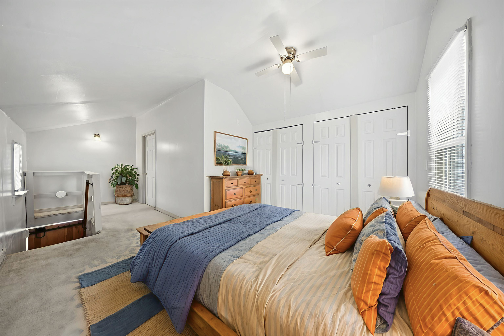 901 Hermann Road Lee, IL 60530 - Photo 11 of 42 a bedroom with a bed and a chandelier