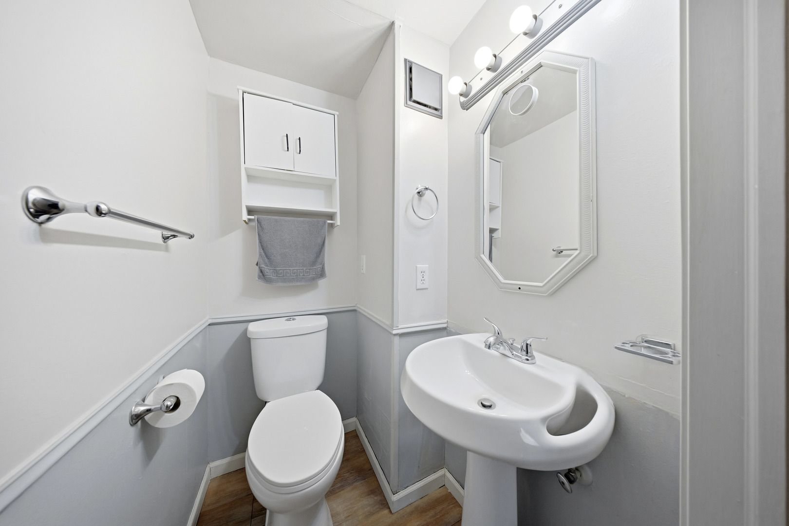 901 Hermann Road Lee, IL 60530 - Photo 26 of 42 a bathroom with a toilet a sink and mirror