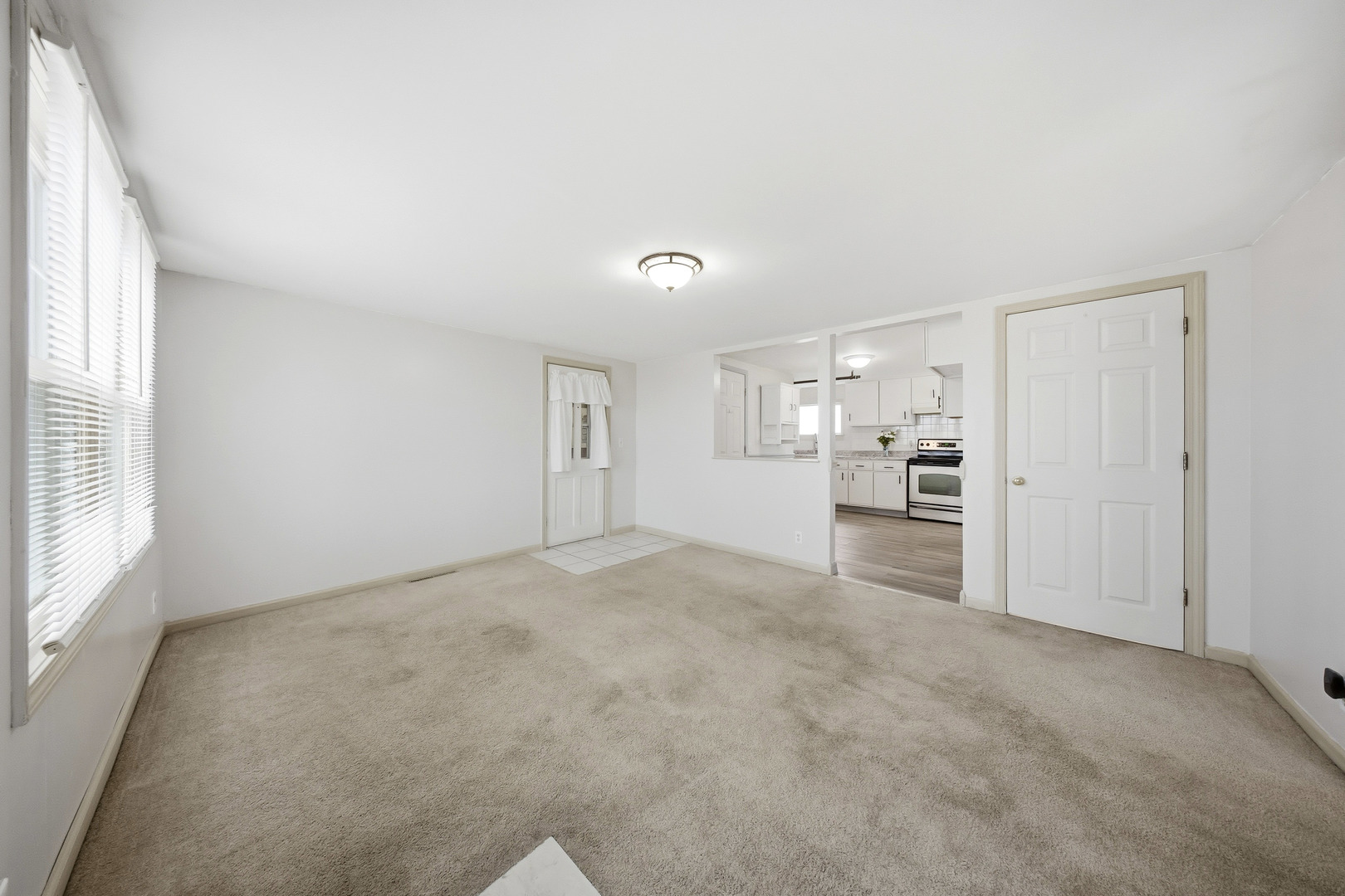 901 Hermann Road Lee, IL 60530 - Photo 3 of 42 a view of a livingroom with wooden furniture and windows