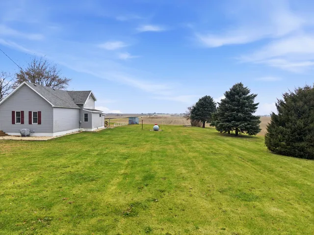 a view of a house with a ocean view