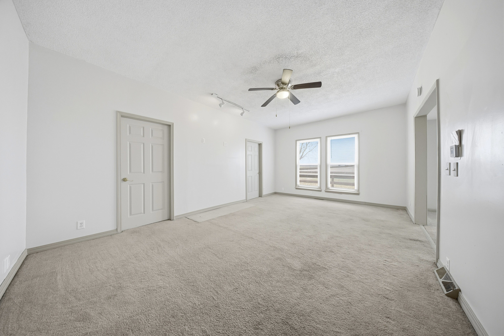 901 Hermann Road Lee, IL 60530 - Photo 7 of 42 a view of an empty room with a window