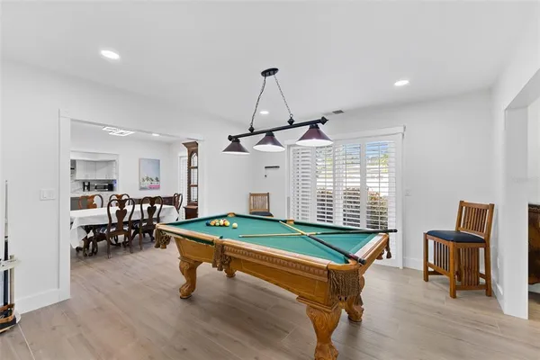 a bedroom with a bed and furniture