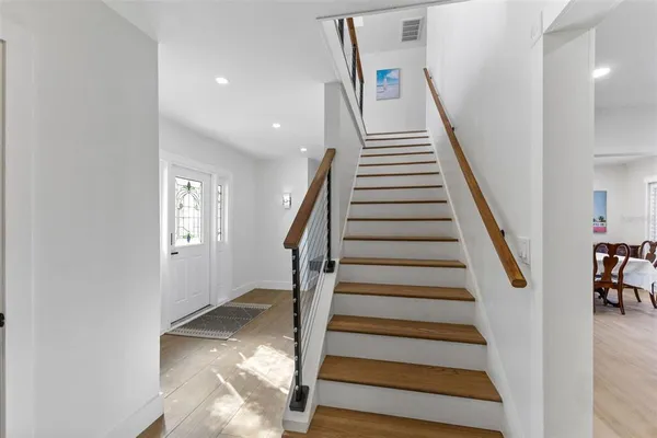 a view of a swimming pool with a yard