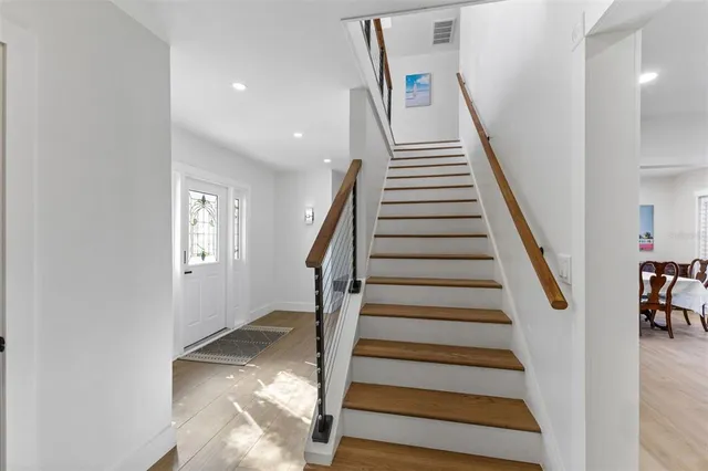 a view of a swimming pool with a yard