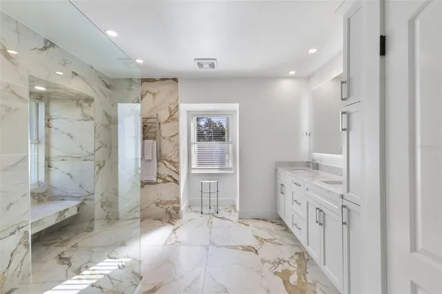 a view of a house with a yard and garage