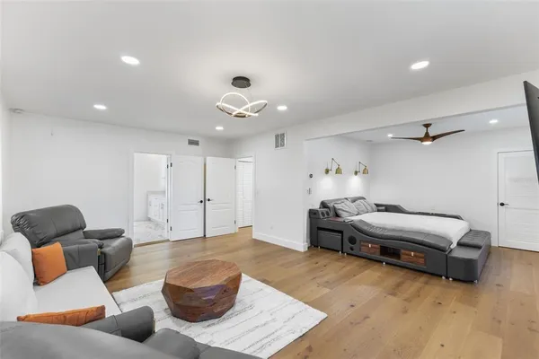 a living room with furniture and a window