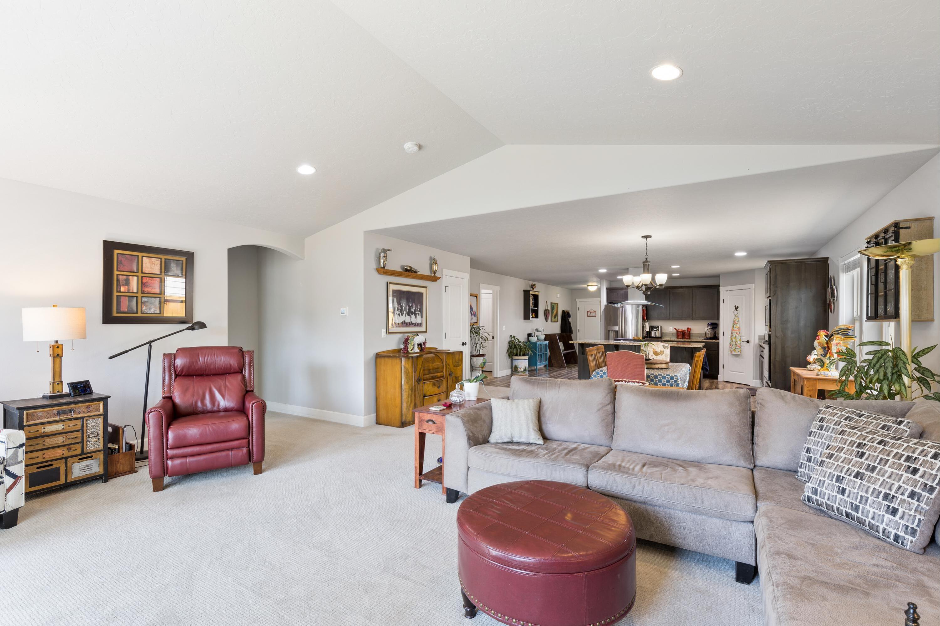 2811 Faith Bend, OR 97701 - Photo 17 of 37 Living room with vaulted ceiling