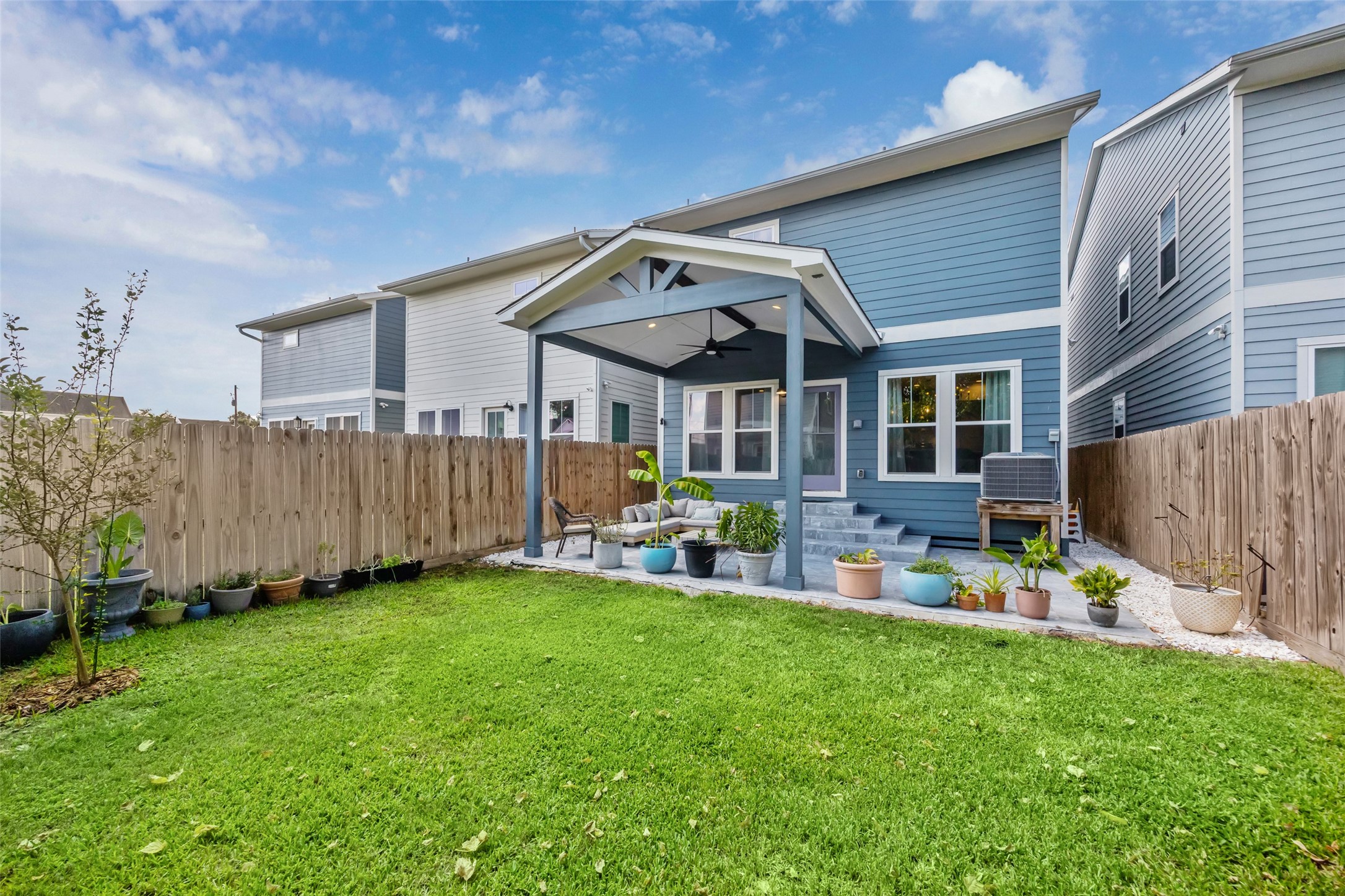 3404 Castor Street Houston, TX 77022 - Photo 25 of 30 a front view of a house with garden and sitting area