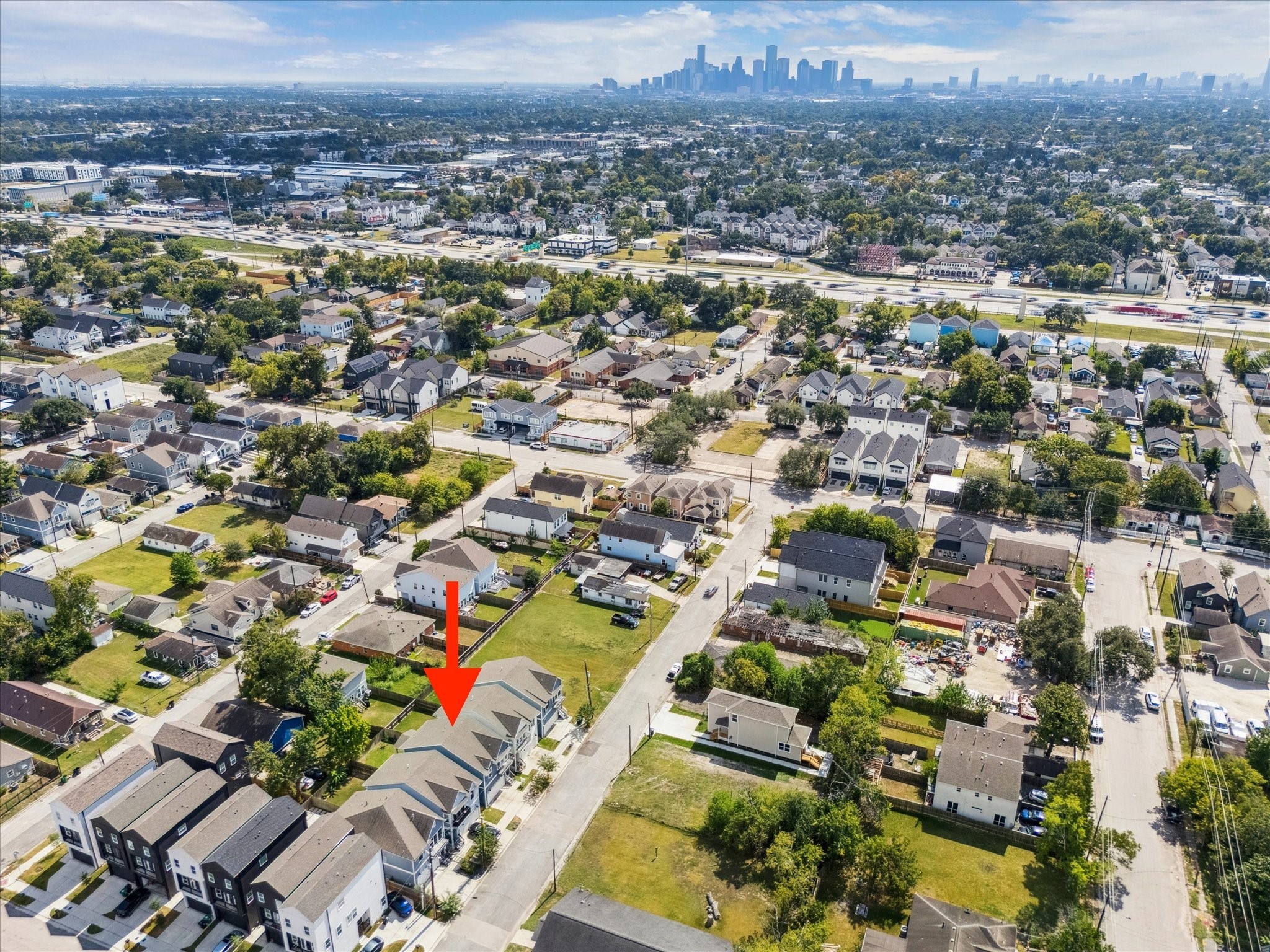 3404 Castor Street Houston, TX 77022 - Photo 29 of 30 an aerial view of a city with lots of residential buildings