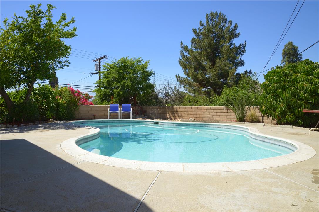 152 West Broadbent Drive Riverside, CA 92507 - Photo 1 of 1 a view of outdoor space and swimming pool