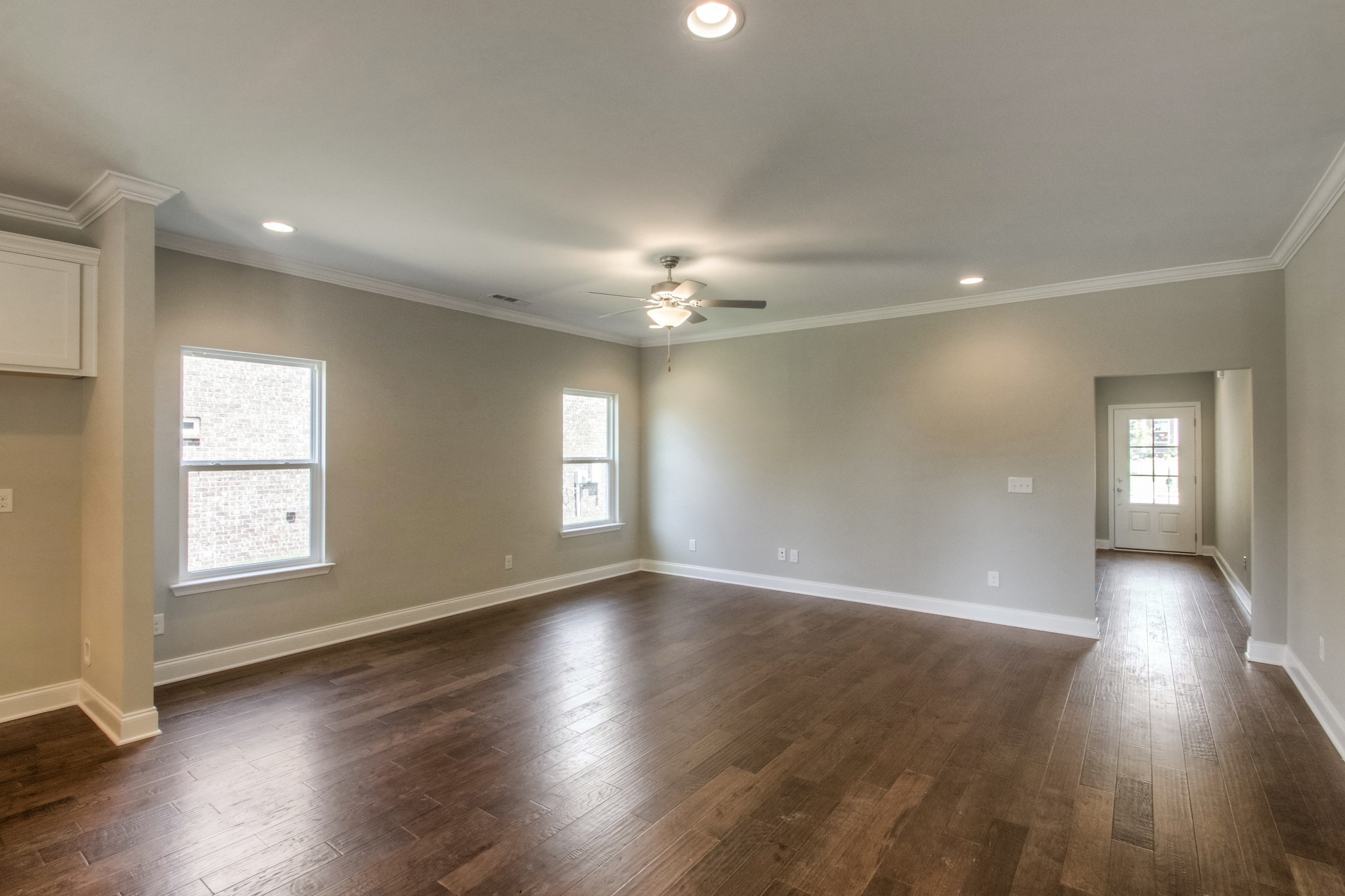 1529 Holton Road Gallatin, TN 37066 - Photo 13 of 33 a view of an empty room with wooden floor and a window