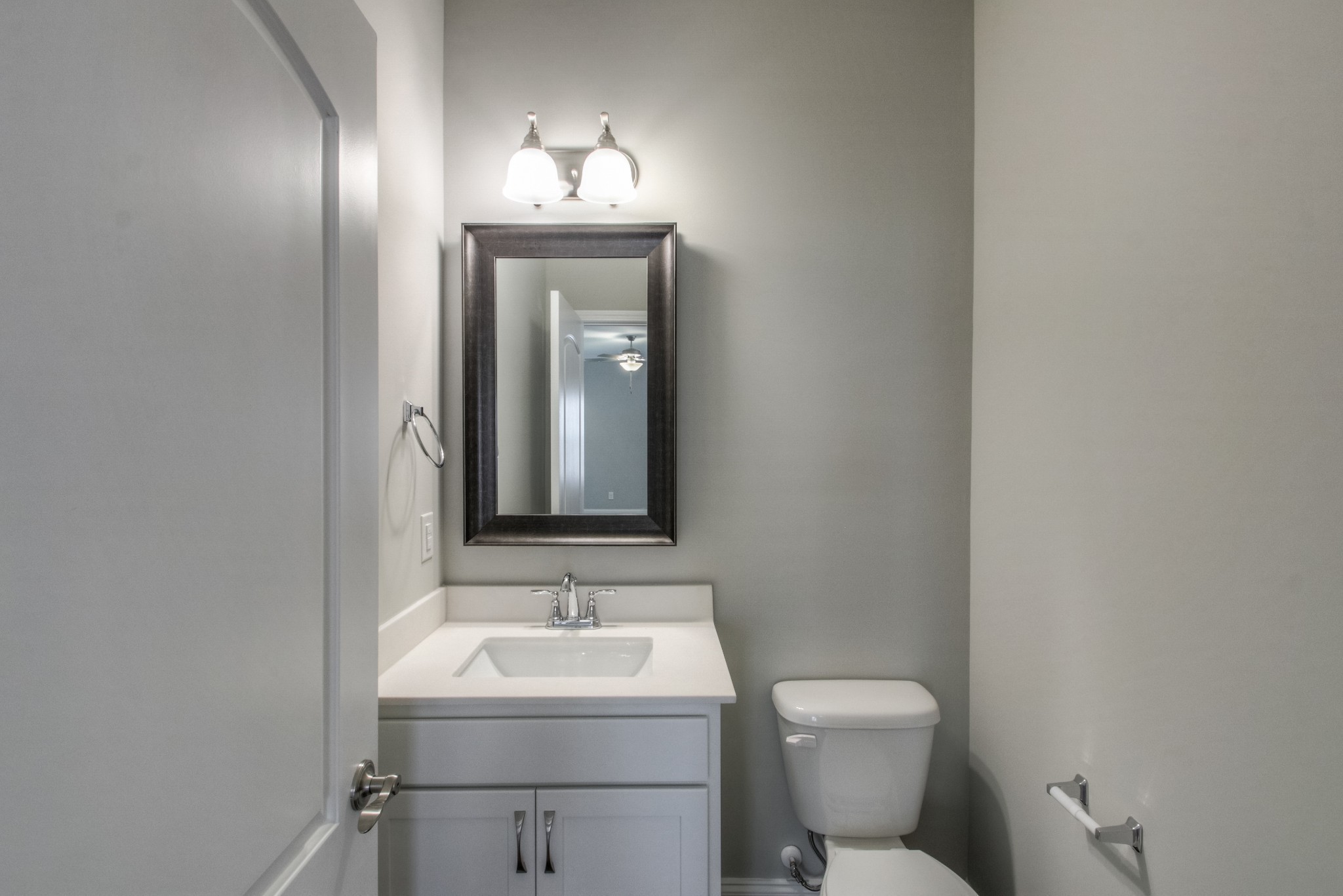 1529 Holton Road Gallatin, TN 37066 - Photo 14 of 33 a bathroom with a toilet sink and mirror