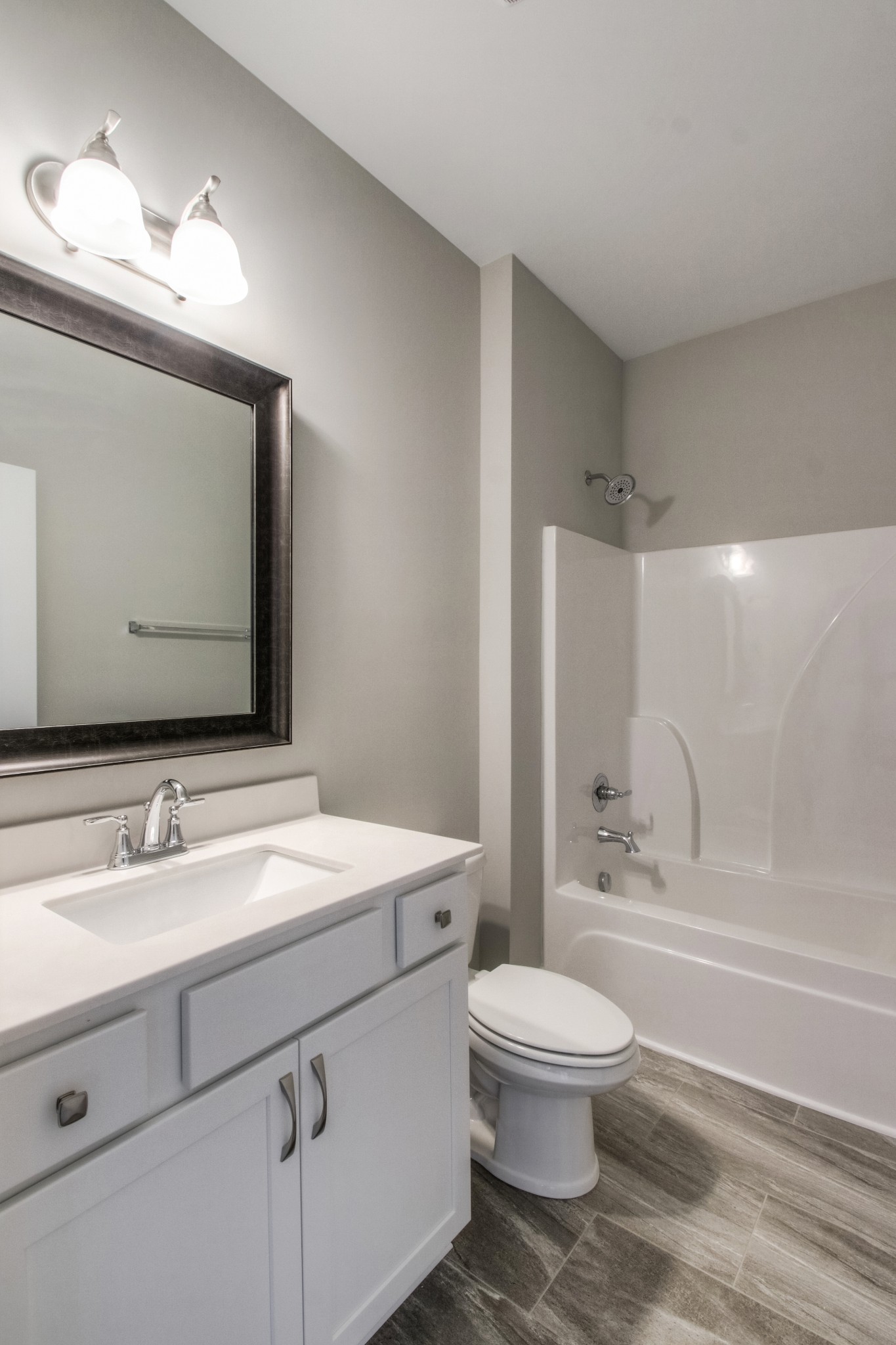 1529 Holton Road Gallatin, TN 37066 - Photo 24 of 33 a bathroom with a toilet a sink a mirror and bathtub