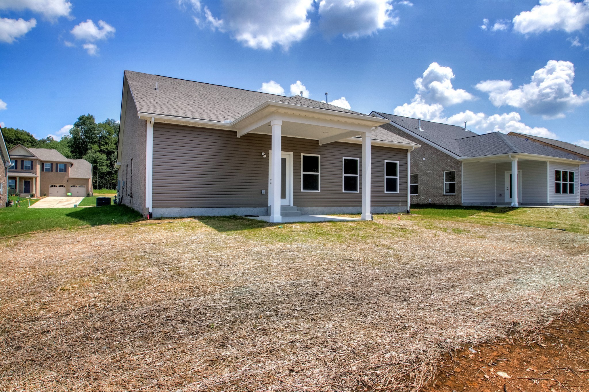 1529 Holton Road Gallatin, TN 37066 - Photo 26 of 33 a view of a house with a yard and potted plants