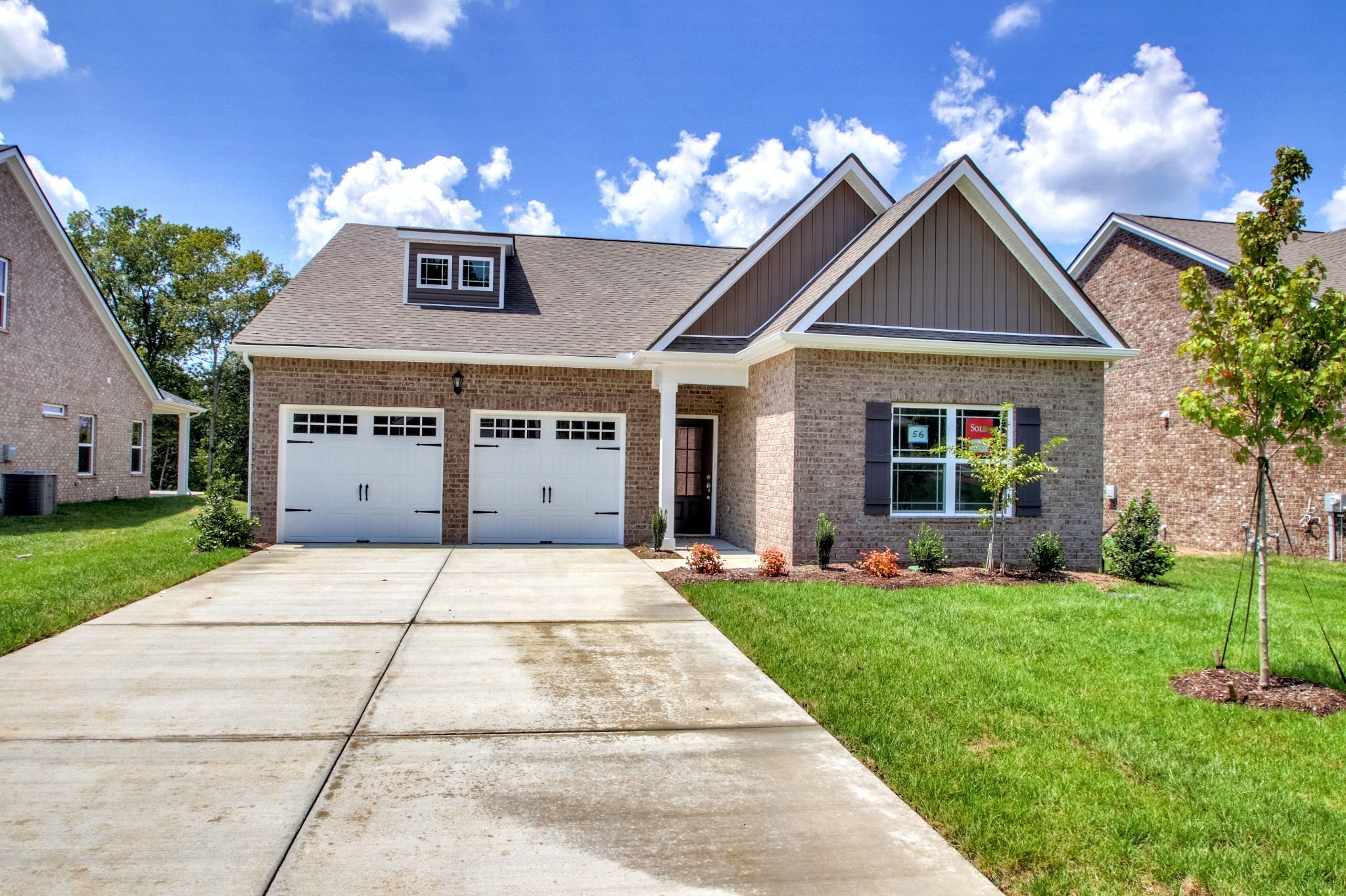 1529 Holton Road Gallatin, TN 37066 - Photo 4 of 33 a front view of a house with a yard and garage