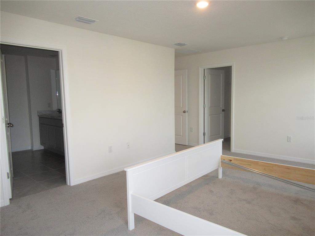 12178 Lily Magnolia Lane Riverview, FL 33569 - Photo 13 of 23 a view of an empty room