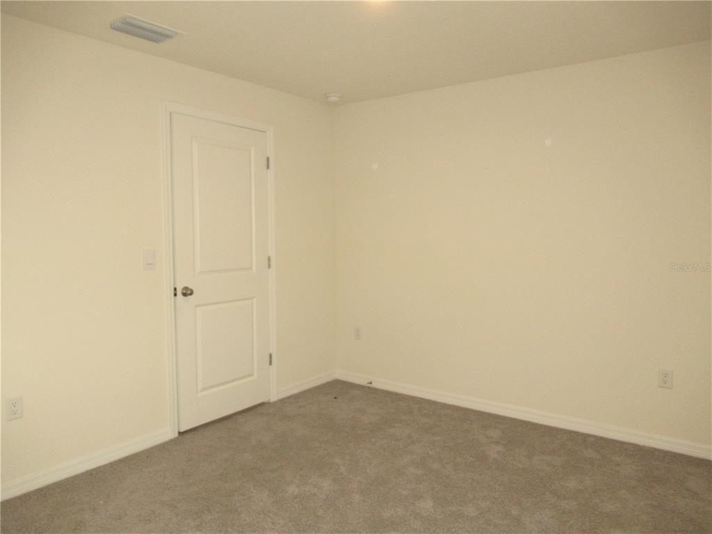 12178 Lily Magnolia Lane Riverview, FL 33569 - Photo 7 of 23 a view of empty room