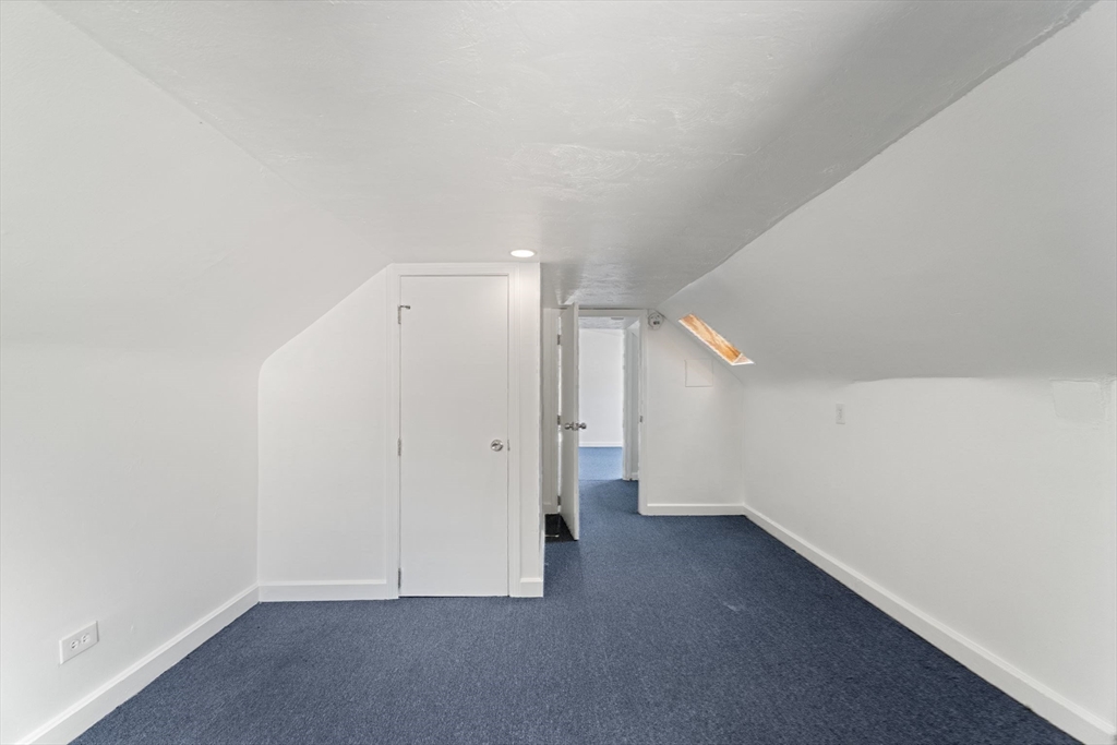 25 Tip Top Street, Unit 2 Boston, MA 02135 - Photo 29 of 35 a view of an empty room