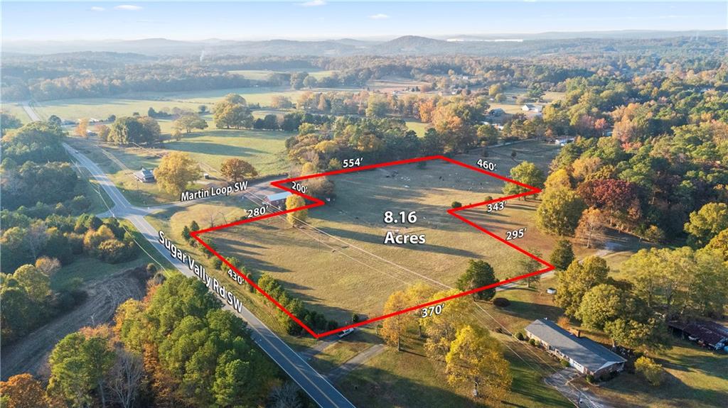 1100 Sugar Valley Road Southwest Cartersville, GA 30120 - Photo 10 of 10 an aerial view of residential houses with outdoor space