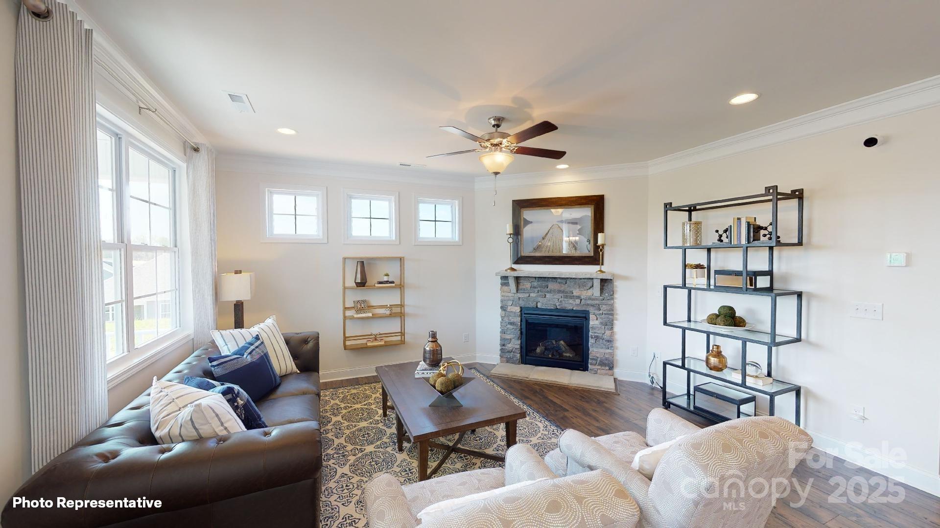 7653 Bainbridge Road Sherrills Ford, NC 28673 - Photo 11 of 25 a living room with furniture or window and a fireplace