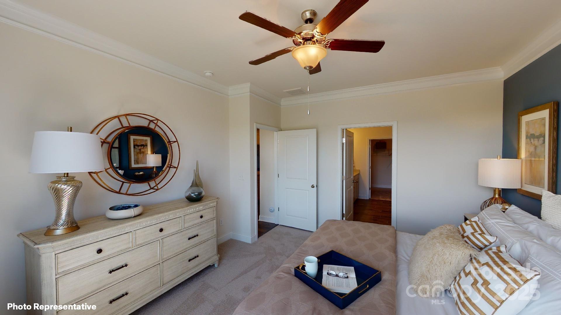 7653 Bainbridge Road Sherrills Ford, NC 28673 - Photo 19 of 25 a bedroom with a bed and a dresser
