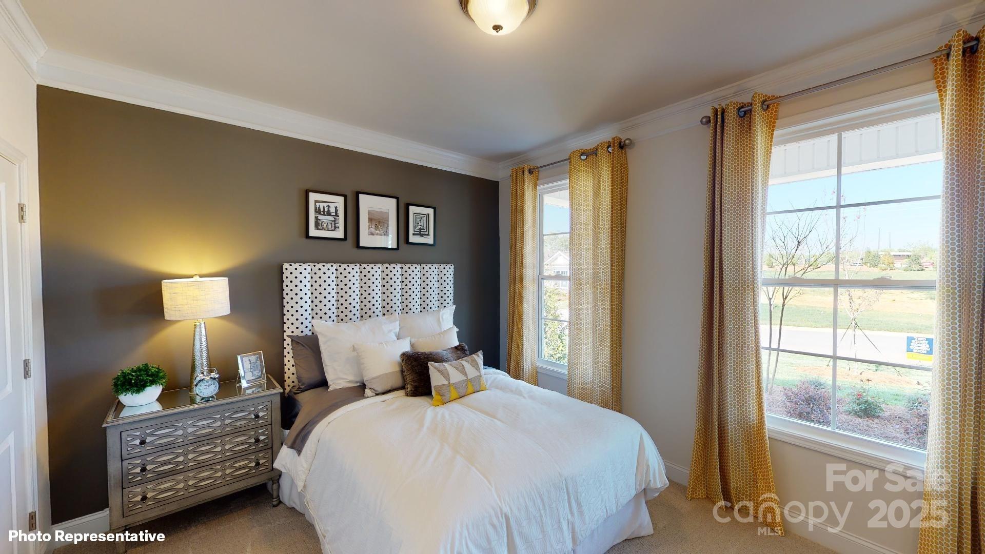 7653 Bainbridge Road Sherrills Ford, NC 28673 - Photo 3 of 25 a bedroom with a bed and window
