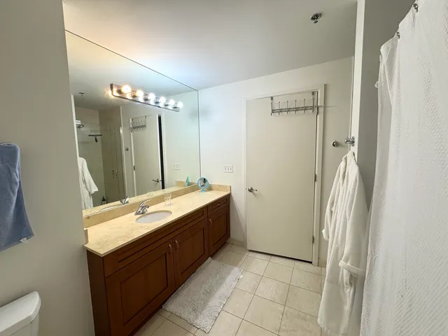 a bathroom with a bath tub and shower