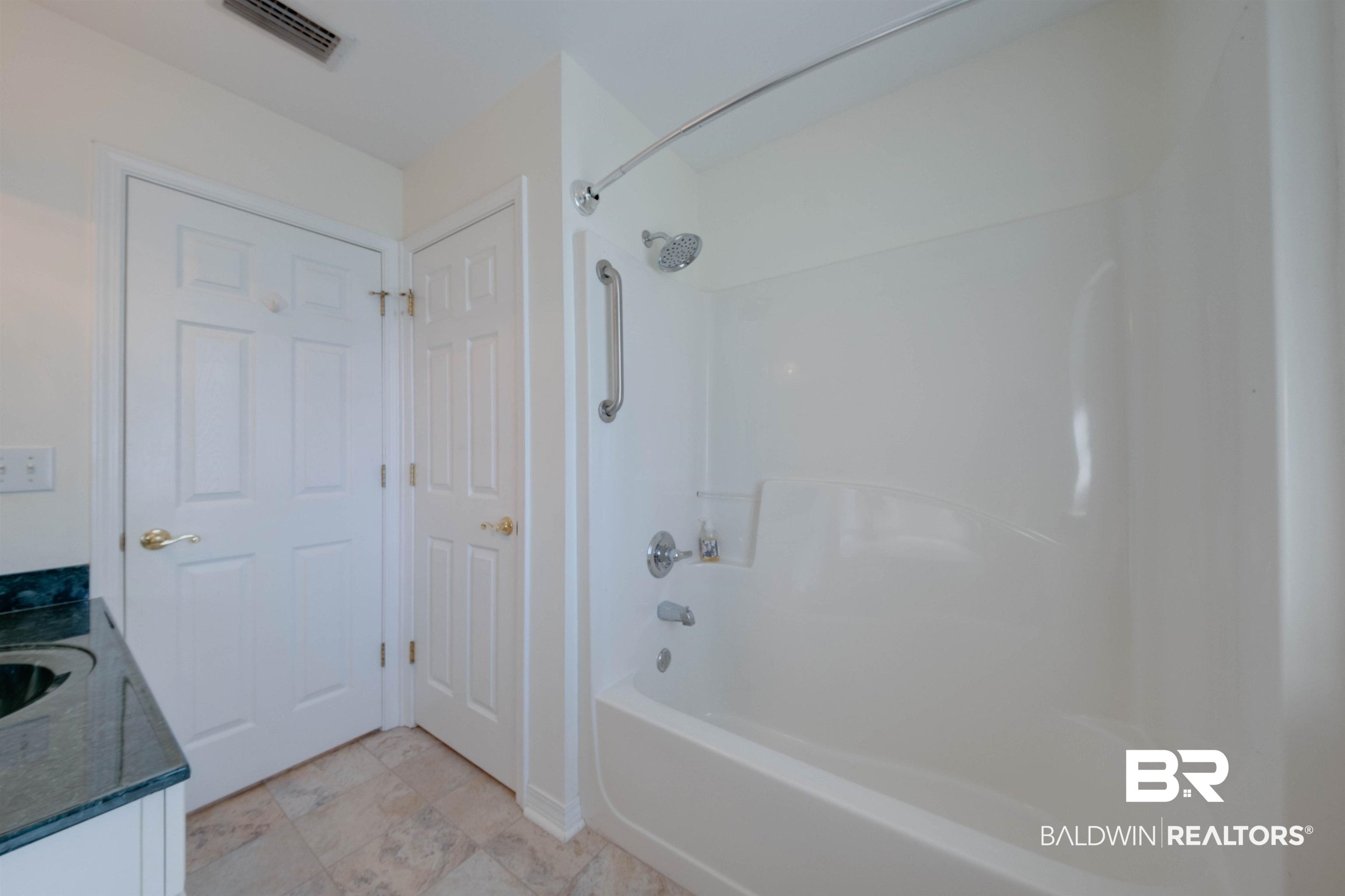 9462 Lakeview Drive Foley, AL 36535 - Photo 35 of 50 Bathroom featuring vanity and tub / shower combination