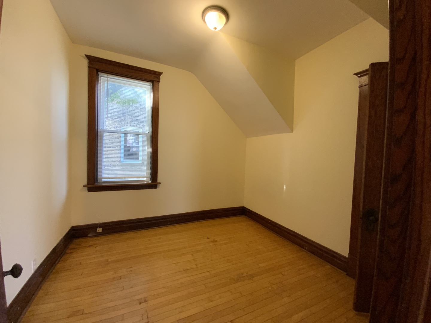 3116 North Elston Avenue, Unit 1 Chicago, IL 60618 - Photo 14 of 16 an empty room with windows